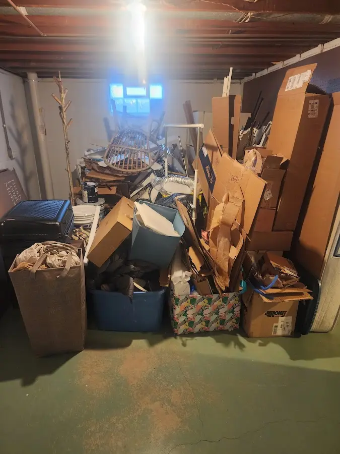 Roll-off dumpster container at job site for 4 Yard Dumpster Rental in Mooers